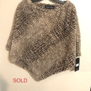 Gorgeous woman’s poncho